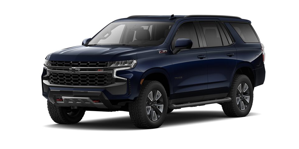 Chevrolet Tahoe 2023, SUV con 3 filas de asientos en color azul lunar