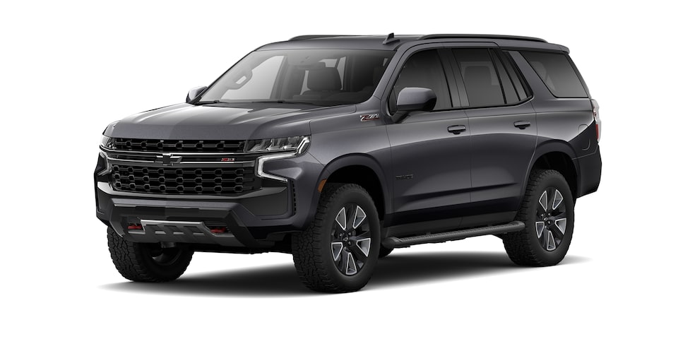 Chevrolet Tahoe 2023, SUV con 3 filas de asientos en color gris asfalto metálico